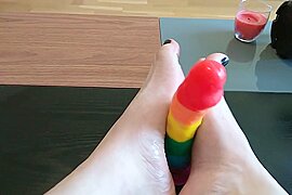 Femboy crossdresser gives rainbow dildo a footjob - free porn video